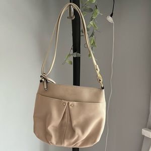designer purse with gold accent